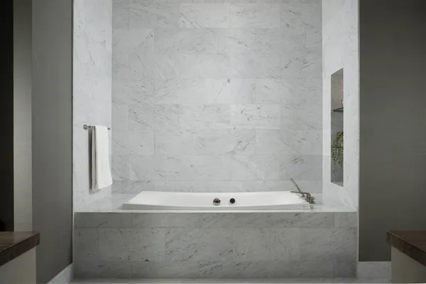 closeup of a bathtub in a bathroom