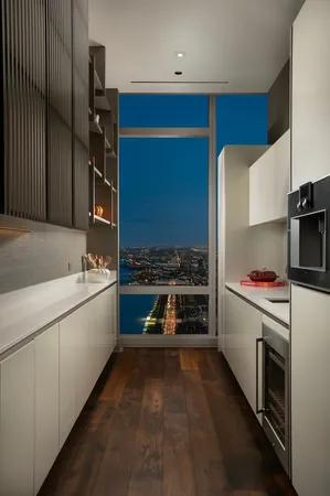 a kitchen with stainless steel appliances a stove and a refrigerator