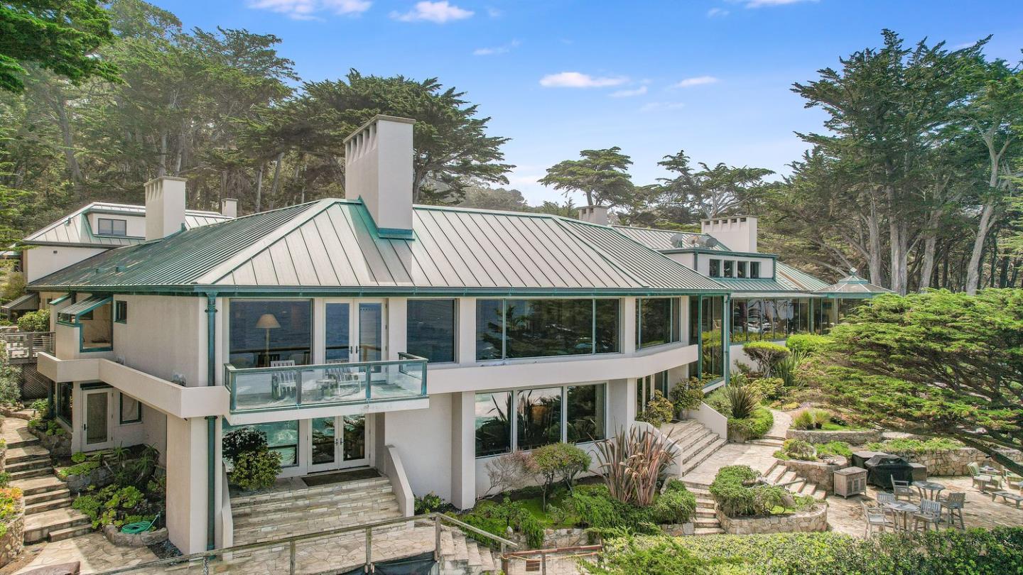 157-163 Spindrift Road Carmel, CA 93923 - Photo 6 of 100 a front view of a house with a garden