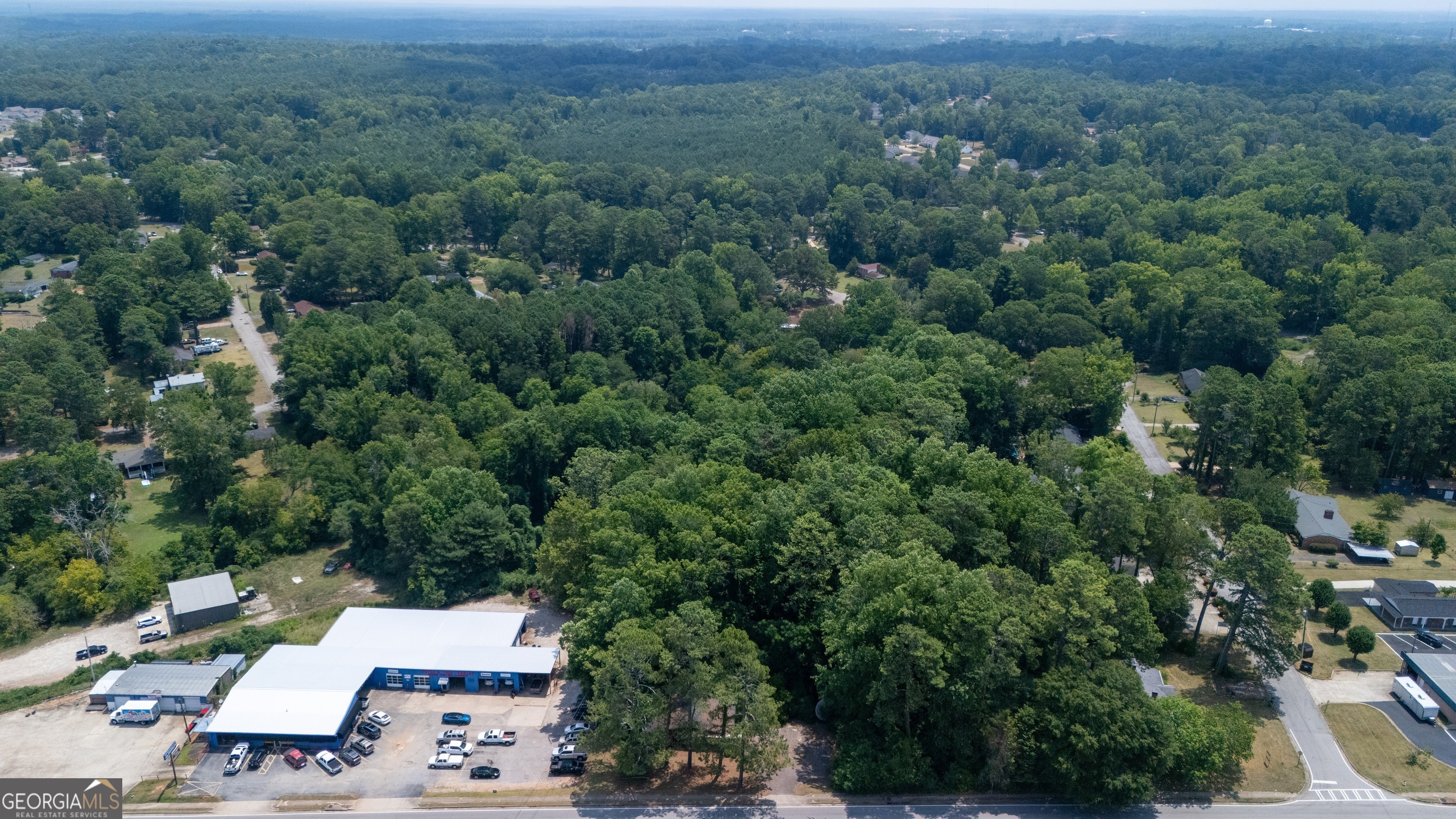 806 New Franklin Road LaGrange, GA 30241 - Photo 3 of 5 an aerial view of a city with lots of residential buildings