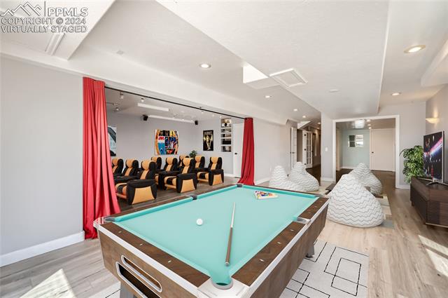 12850 Northcliff Road Elbert, CO 80106 - Photo 11 of 14 Virtually staged basement family/game room with walkout and home theater