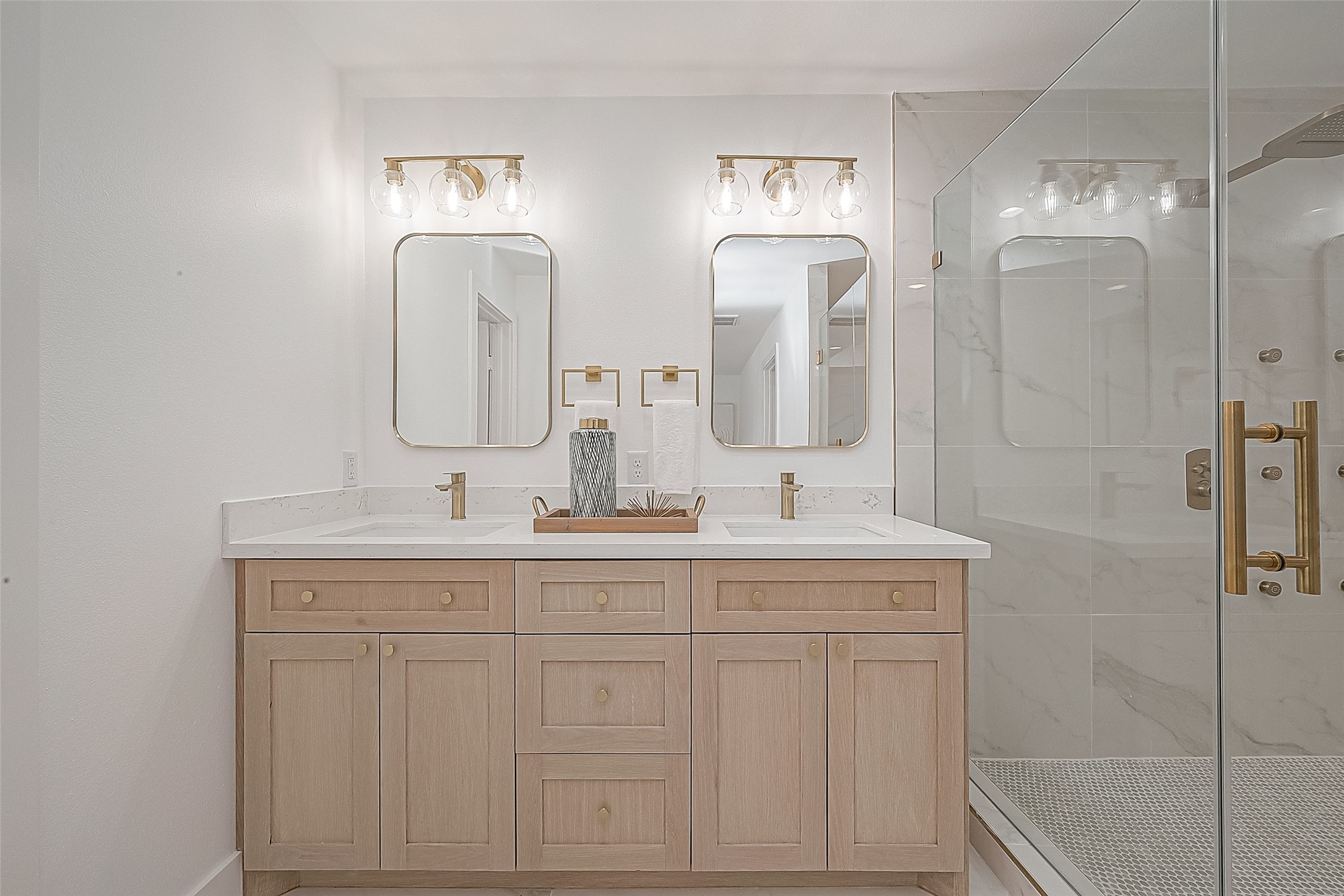 6254 Locke Lane Houston, TX 77057 - Photo 20 of 44 a bathroom with double sink a toilet a shower and a mirror