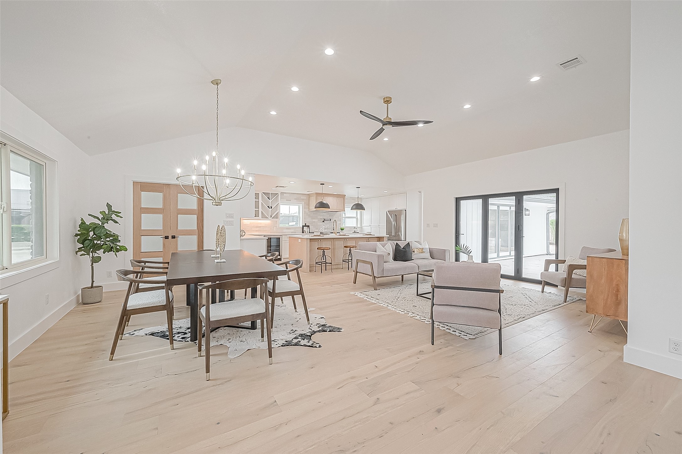 6254 Locke Lane Houston, TX 77057 - Photo 2 of 44 a view of a dining room with furniture window and wooden floor