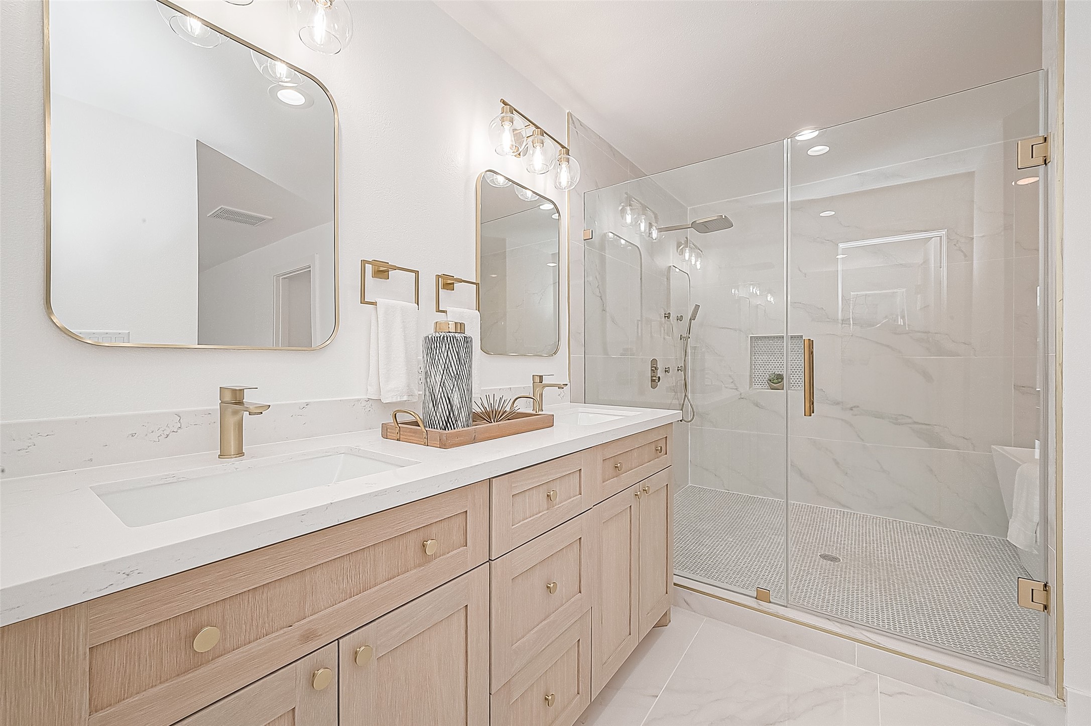 6254 Locke Lane Houston, TX 77057 - Photo 21 of 44 a bathroom with a shower sink and mirror