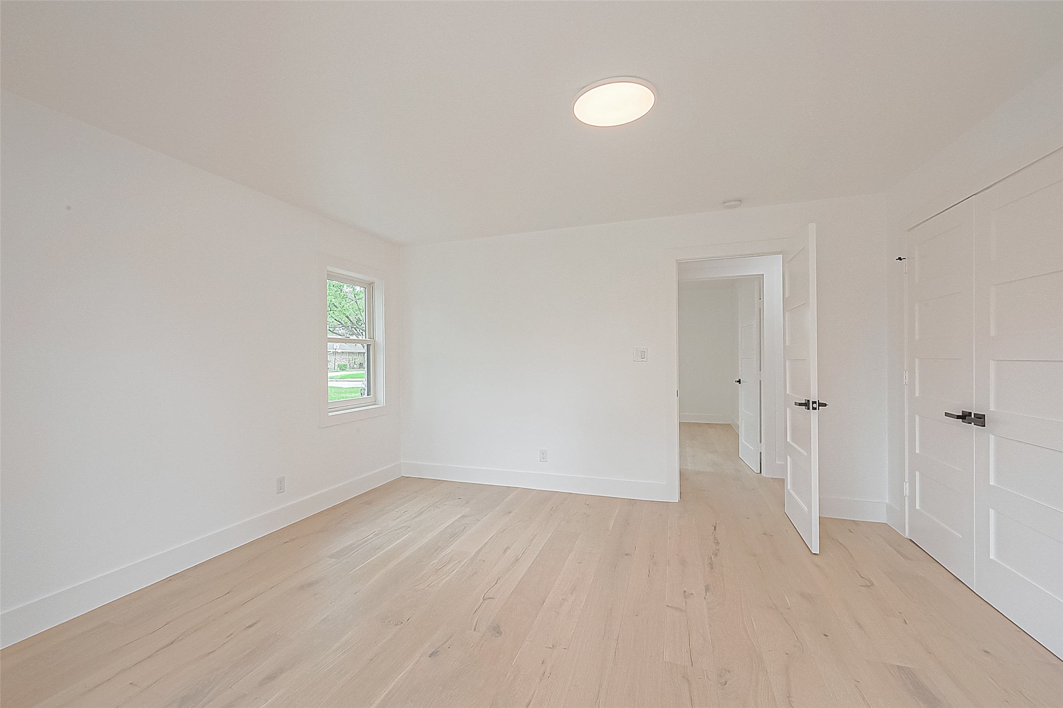 6254 Locke Lane Houston, TX 77057 - Photo 31 of 44 a view of an empty room with a window