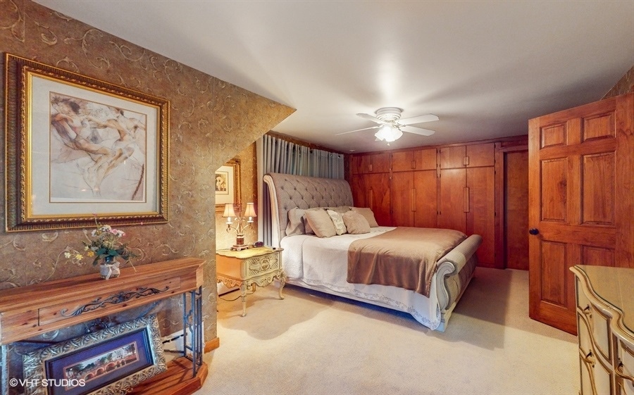 633 Oakland Avenue Elgin, IL 60120 - Photo 15 of 35 a bedroom with a bed dresser and a window