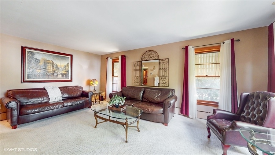 633 Oakland Avenue Elgin, IL 60120 - Photo 2 of 35 a living room with furniture and a window