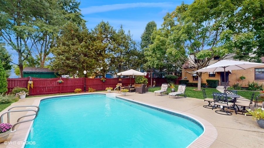 633 Oakland Avenue Elgin, IL 60120 - Photo 28 of 35 an outdoor space with swimming pool and furniture