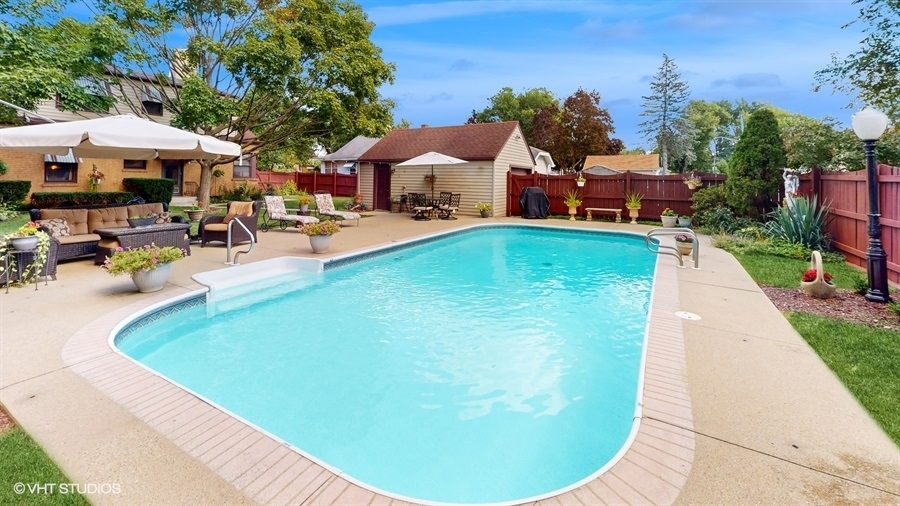 633 Oakland Avenue Elgin, IL 60120 - Photo 29 of 35 a swimming pool with outdoor seating yard and barbeque oven