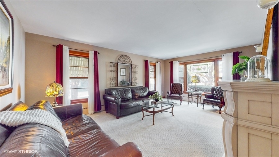 633 Oakland Avenue Elgin, IL 60120 - Photo 4 of 35 a living room with furniture and a large window