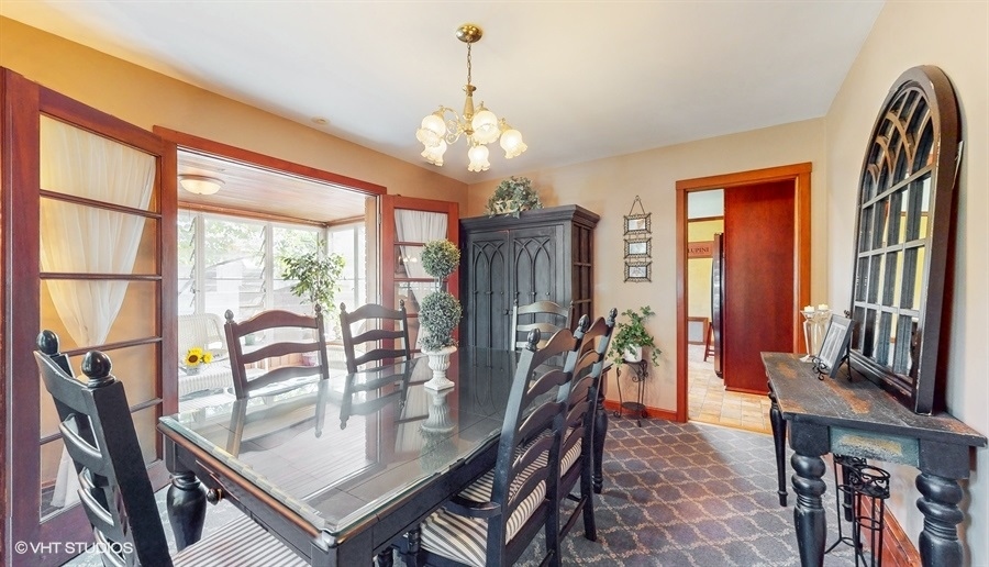 633 Oakland Avenue Elgin, IL 60120 - Photo 6 of 35 a view of a dining room with furniture window and outside view