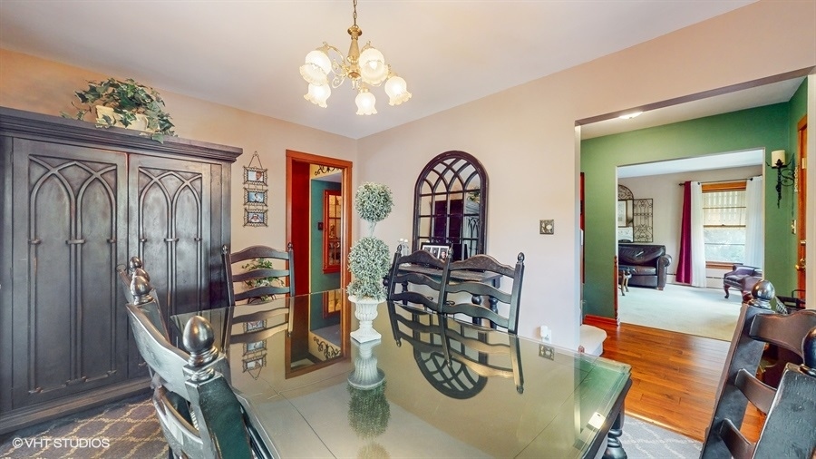 633 Oakland Avenue Elgin, IL 60120 - Photo 7 of 35 a view of a dining room with furniture