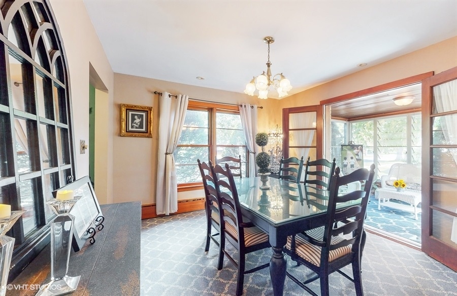 633 Oakland Avenue Elgin, IL 60120 - Photo 8 of 35 a view of a dining room with furniture window and outside view