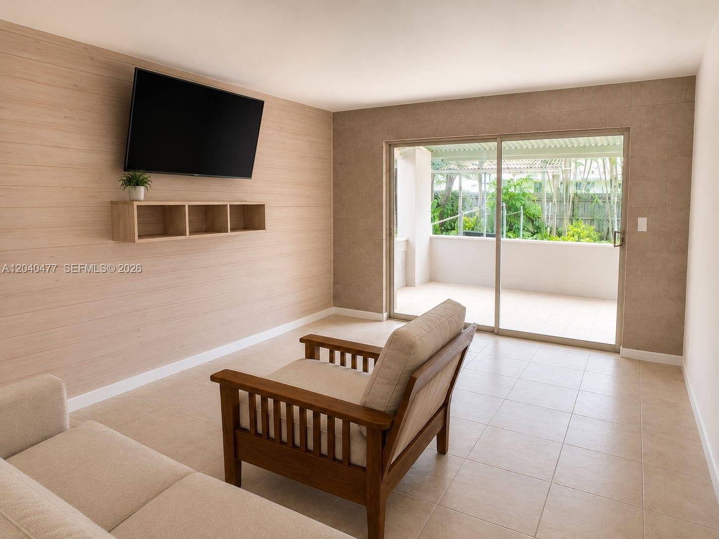 9110 Southwest 44th Street Miami, FL 33165 - Photo 18 of 18 a view of a livingroom with furniture and a window
