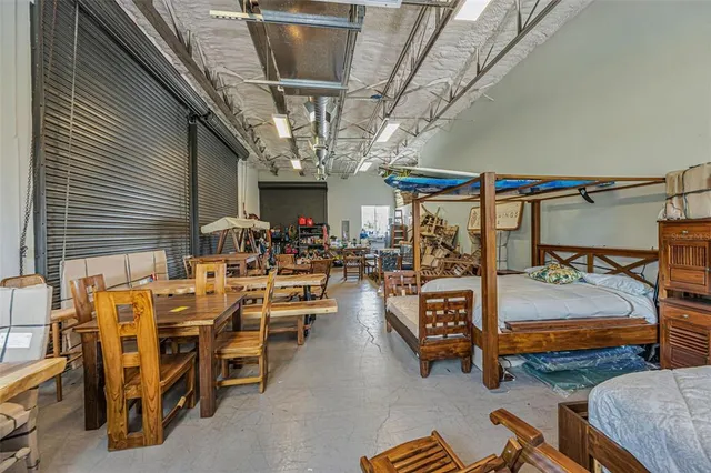 a view of a livingroom with furniture and toys