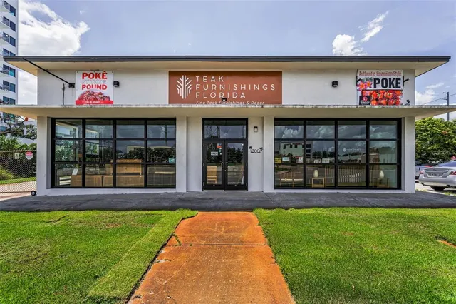 a view of a building with a garden