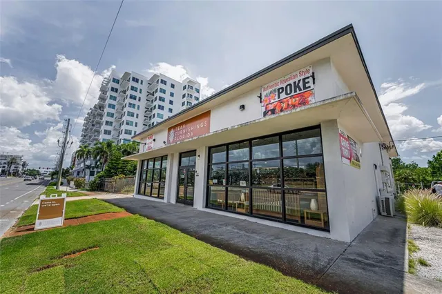 a view of swimming pool with an outdoor seating