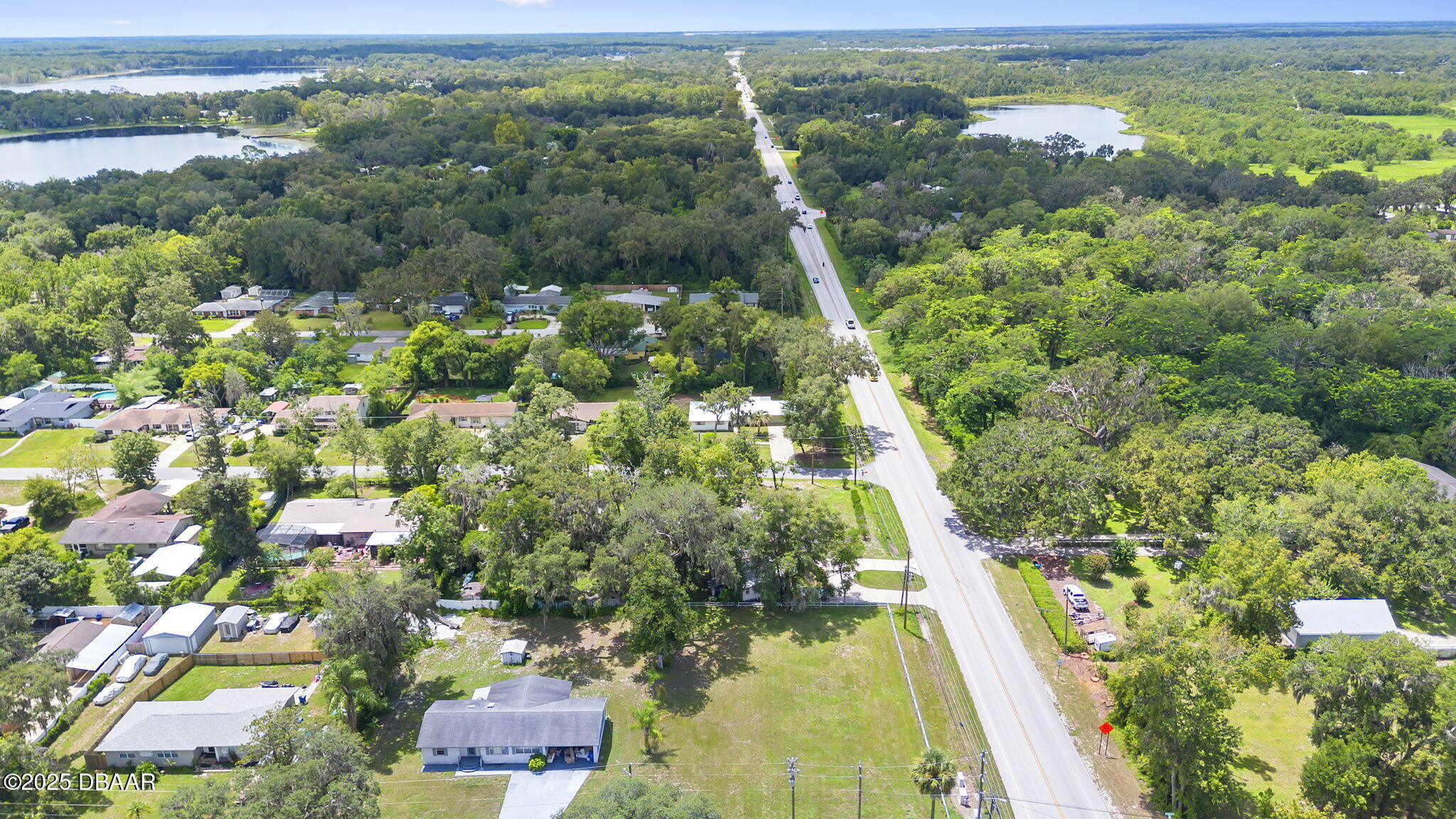 2202 Lake Ruby Road DeLand, FL 32724 - Photo 5 of 13 an aerial view of residential houses with outdoor space