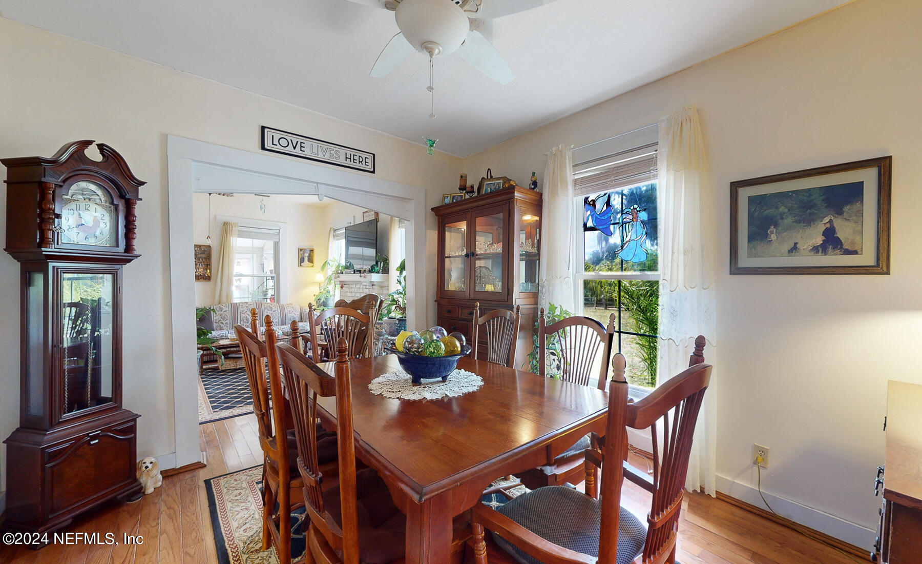 134 East End Road San Mateo, FL 32187 - Photo 12 of 45 a view of a dining room with furniture and wooden floor