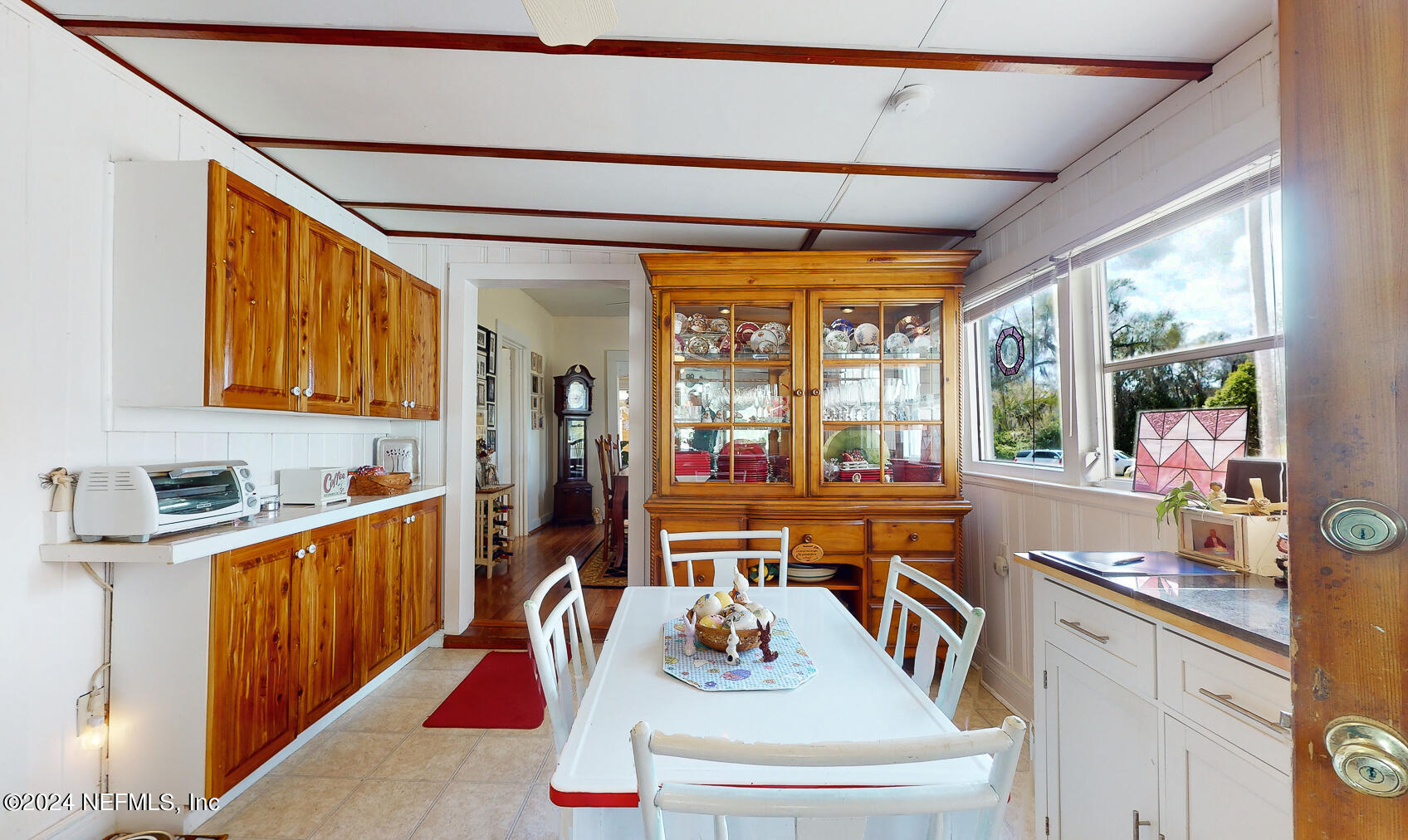 134 East End Road San Mateo, FL 32187 - Photo 18 of 45 a dining table with chairs and window