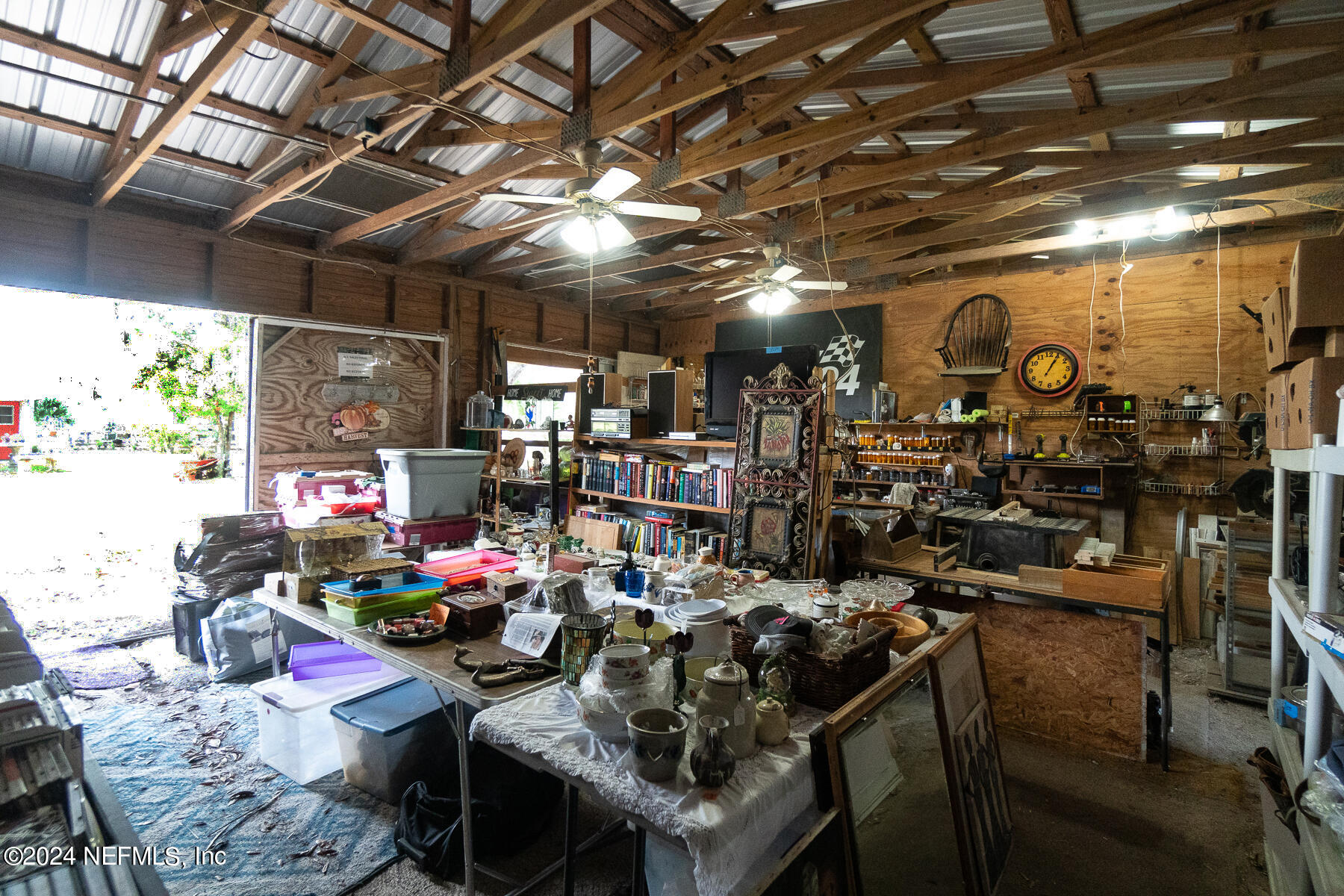 134 East End Road San Mateo, FL 32187 - Photo 31 of 45 a room with lots of storage and lots of furniture