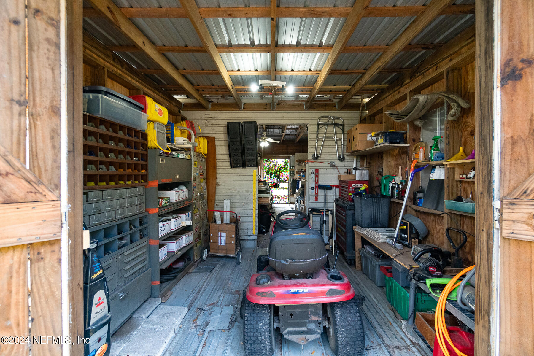 134 East End Road San Mateo, FL 32187 - Photo 32 of 45 a room with lots of wooden furniture