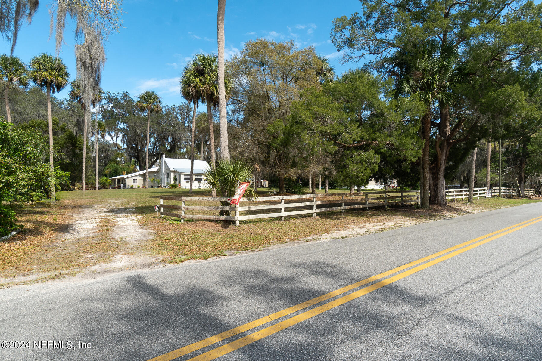 134 East End Road San Mateo, FL 32187 - Photo 36 of 45 a view of a yard with basketball court