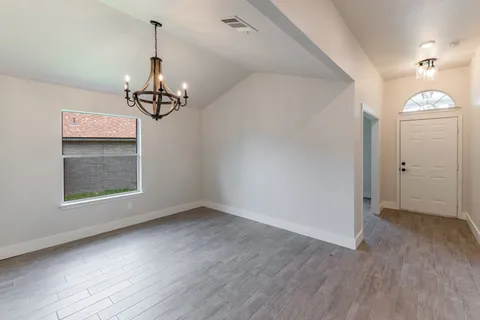 a view of a chandelier in a room