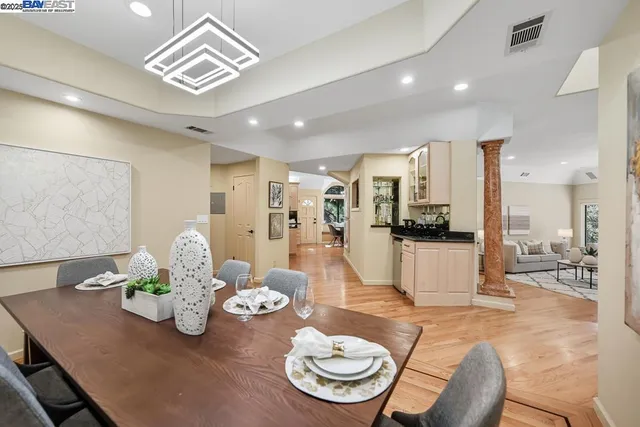 a living room with furniture fireplace and flat screen tv