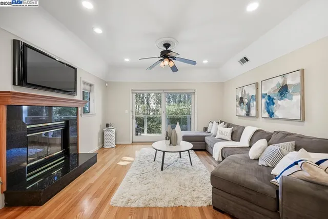 a view of a balcony with chairs