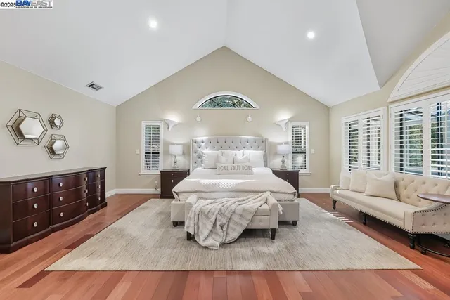 a view of a living room kitchen and a sink