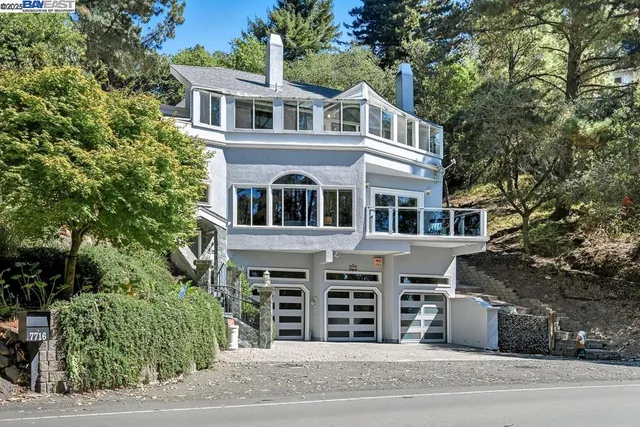 a front view of a house with a garage