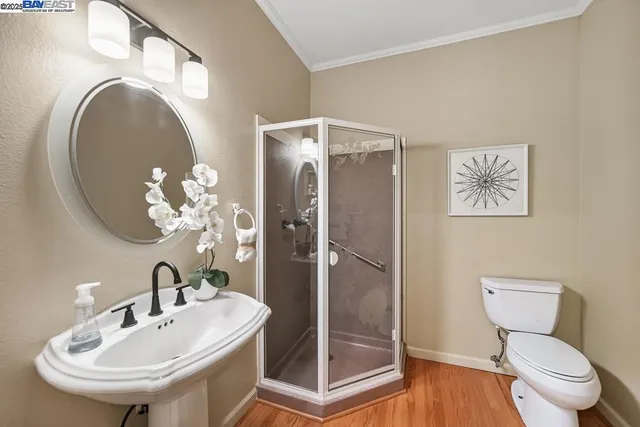 a spacious bedroom with a large bed and a couch