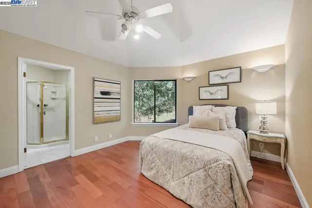 a view of storage and utility room with washer and dryer