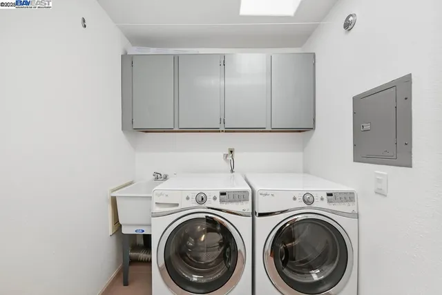 a view of a patio filled with furniture
