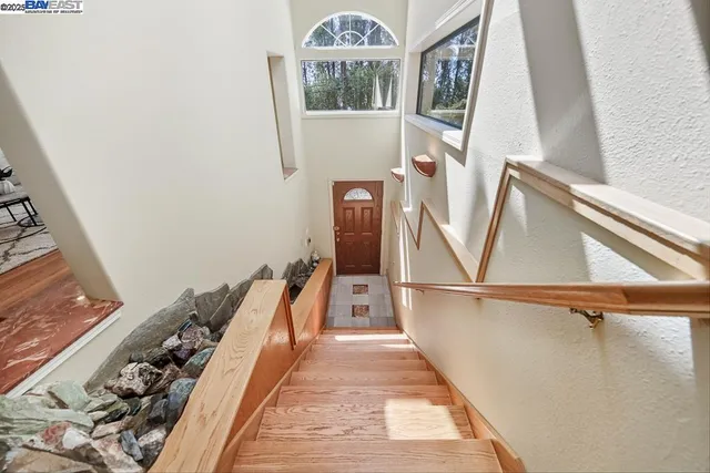 a view of balcony with furniture