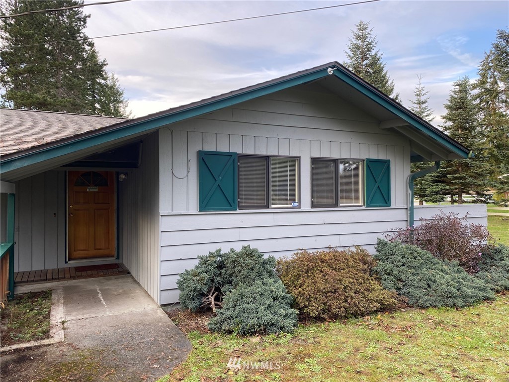 19147 Old Highway 99 Southwest Rochester, WA 98579 - Photo 2 of 27 a house with trees in the background