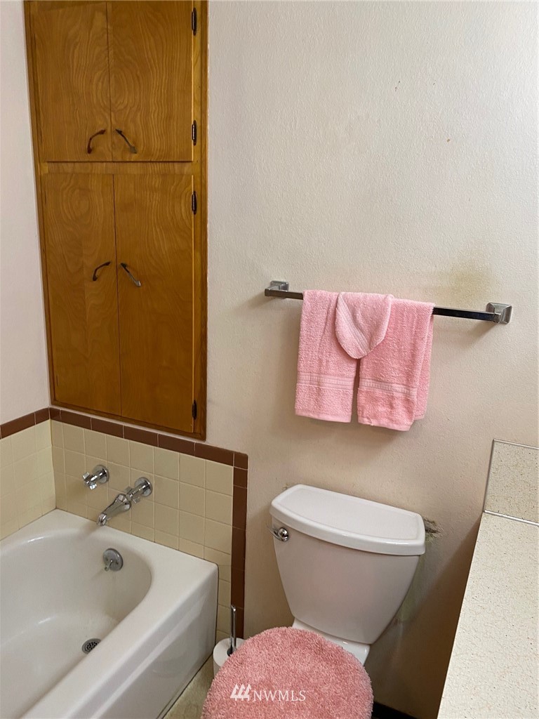 19147 Old Highway 99 Southwest Rochester, WA 98579 - Photo 20 of 27 a bathroom with a sink and a toilet