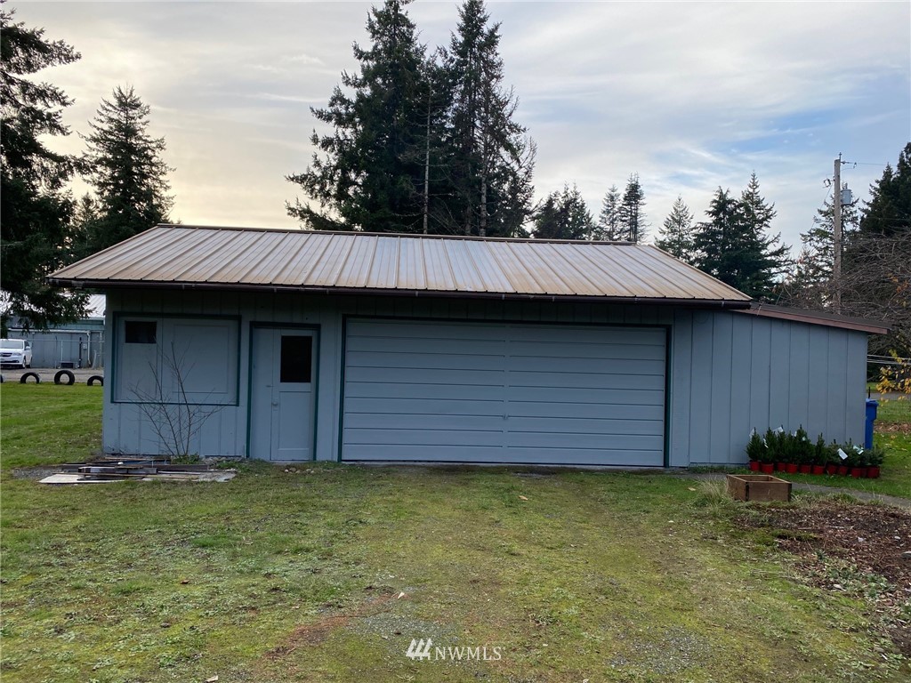 19147 Old Highway 99 Southwest Rochester, WA 98579 - Photo 25 of 27 a view of a house with a backyard
