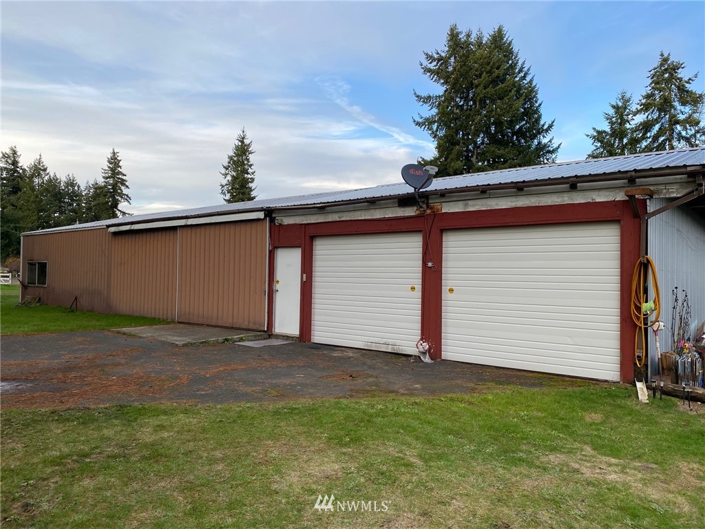 19147 Old Highway 99 Southwest Rochester, WA 98579 - Photo 26 of 27 a front view of house with yard
