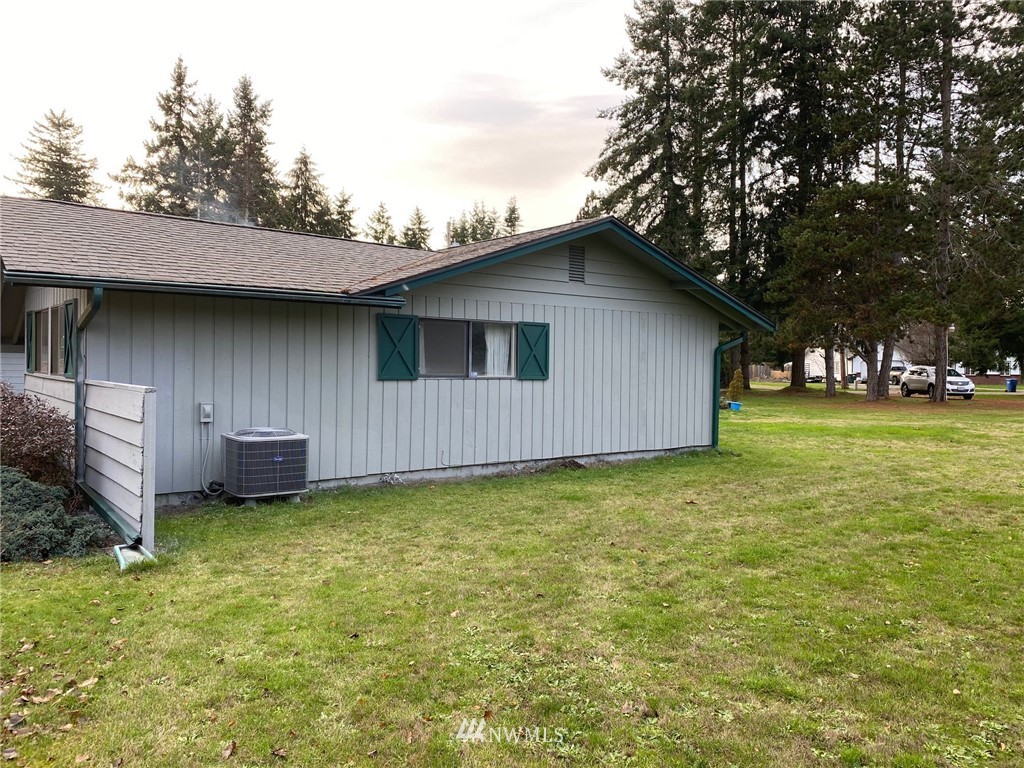 19147 Old Highway 99 Southwest Rochester, WA 98579 - Photo 4 of 27 a backyard of a house with lots of green space