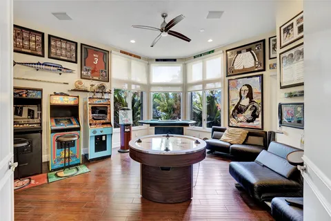 a view of a house and a dinning table and chairs in patio