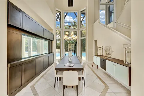 a view of a dining room kitchen and a window