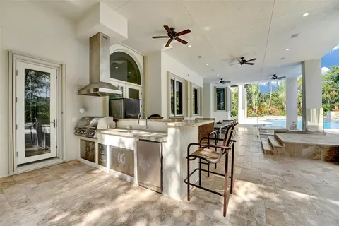 a living room with patio furniture