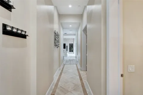 a bathroom with a sink and a large mirror