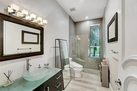 a view of a livingroom with a fireplace furniture and a chandelier