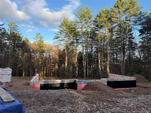 a picture of a bench in front of a building