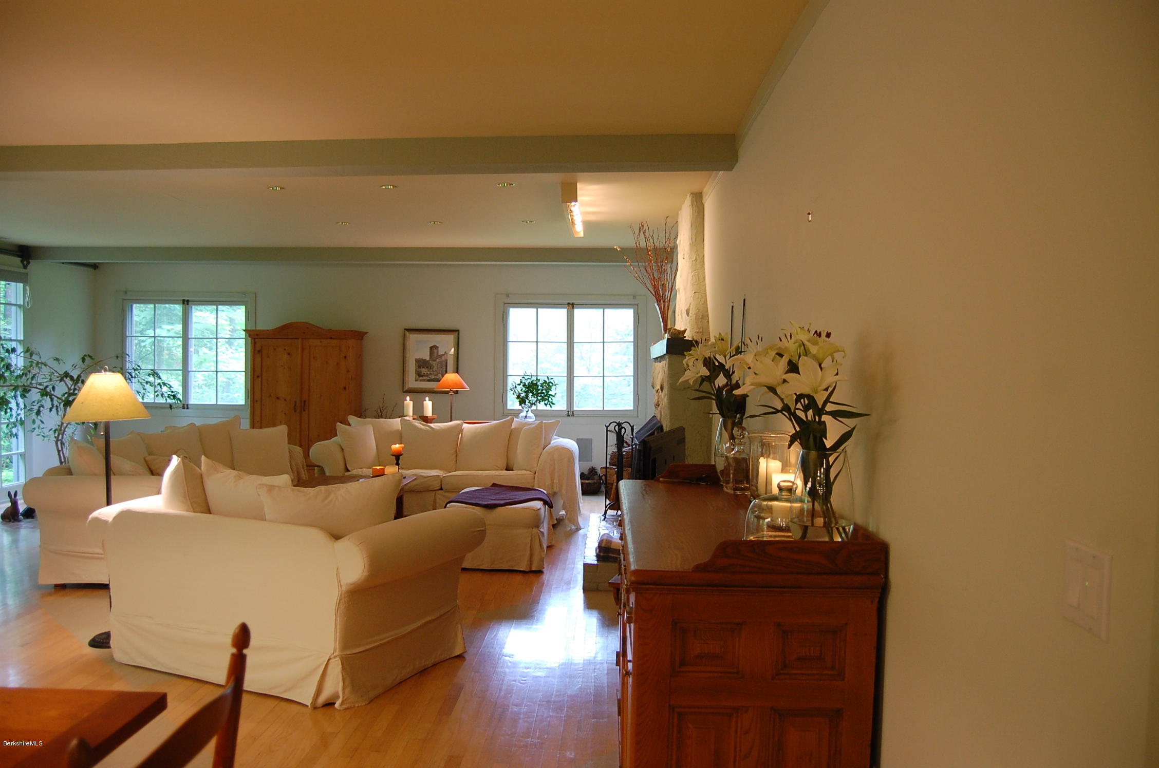 53 Reservoir Road Richmond, MA 01254 - Photo 13 of 37 a living room with furniture and wooden floor