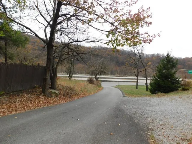 a view of backyard with green space
