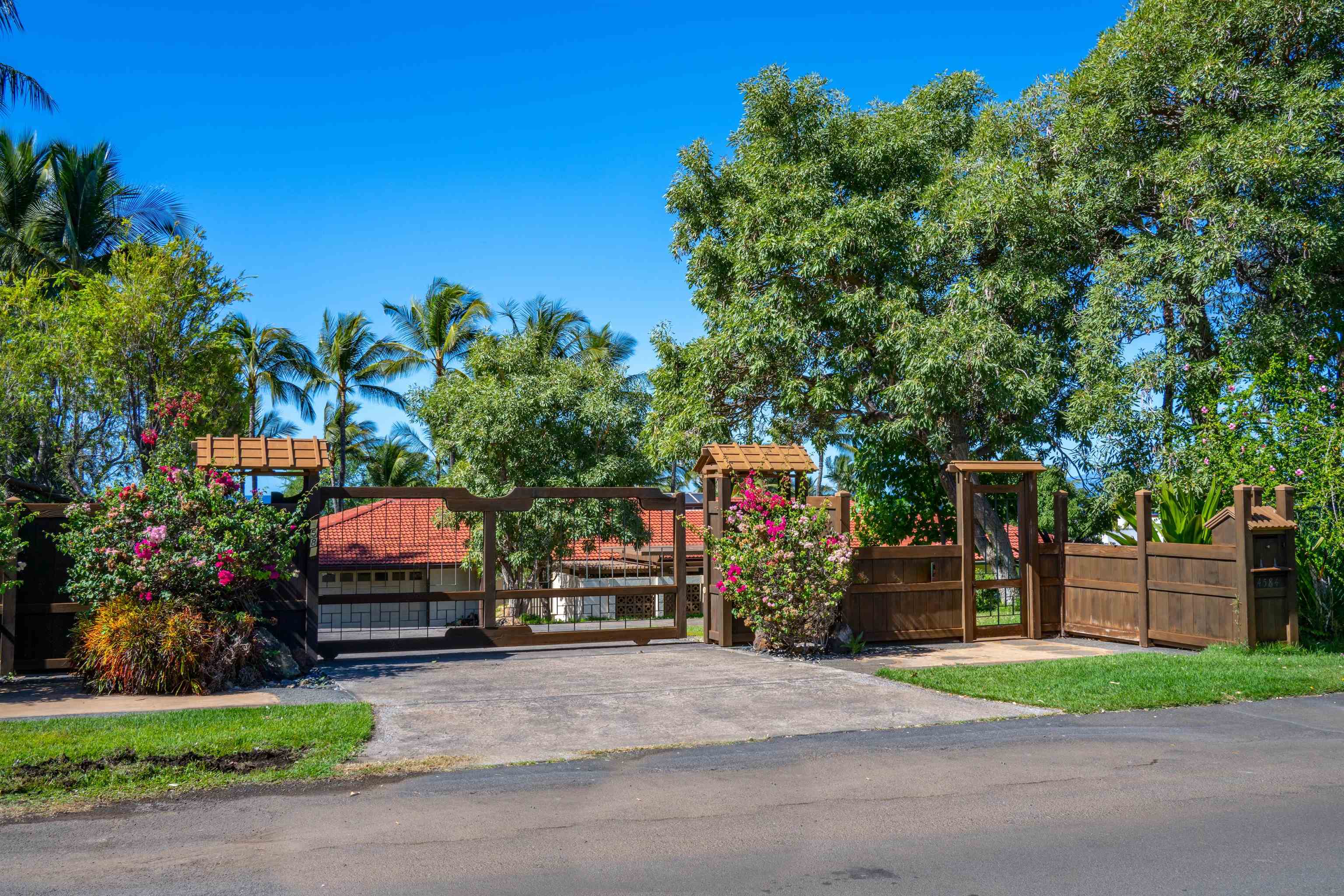 4584 Makena Road Kihei, HI 96753 - Photo 13 of 30 a view of street along with house and trees